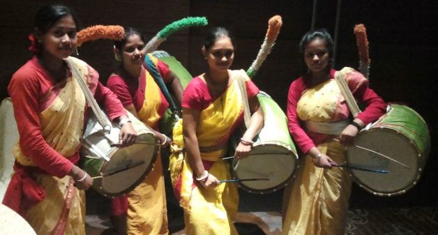 Women have started playing the dhak, a big drum traditionally played only by men. Courtesy of VillageSquare