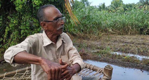 Harvesting rainwater in ponds and recharging groundwater counter the impact of salinity, helping farmers like Dhirubhai Dhudiya improve farm productivity (Photo by Tata Trusts)