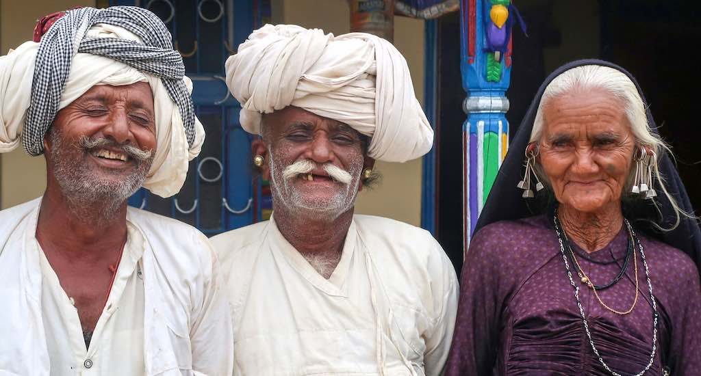 Karabhai Aal (center) with his wife Dosibai Aal and neighbour Ratnabhai Dhagal  (Photo by Namita Waikar)
